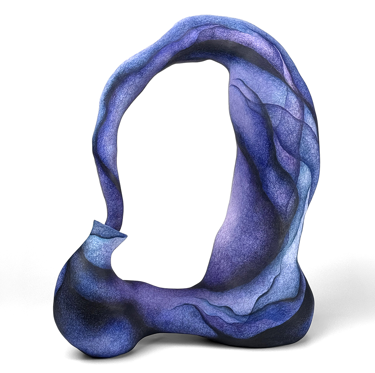 Abstract ceramic sculpture with a swirling design in shades of purple and blue, featuring a hollow center.